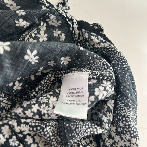 Olivaceous Black and White Floral Halter Tie Neck Open Back Flowy Romper Medium - Picture 7 of 11